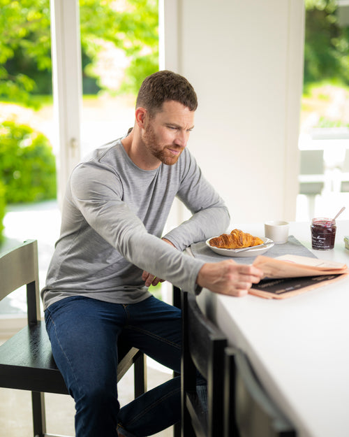man wearing long sleeve merino T-shirt in light grey color